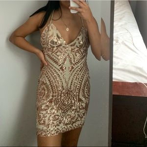 A glam rose gold bodycon dress